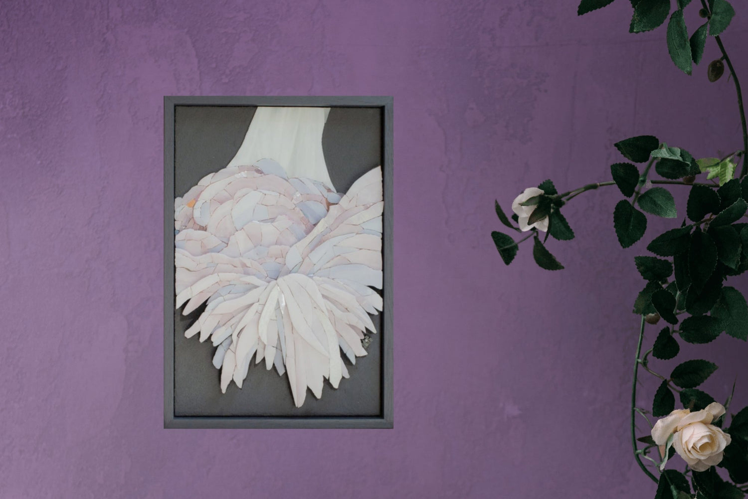 Close-up of the mosaic Intelligent Love against a purple wall, a reminder that caring for art is part of loving it.