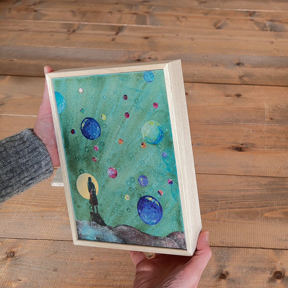 Framed teal watercolour collage called &